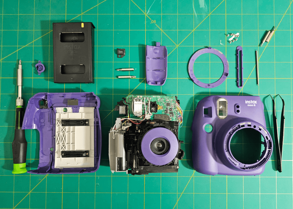 Group image of the Fujifilm Instax Mini 8 teardown.